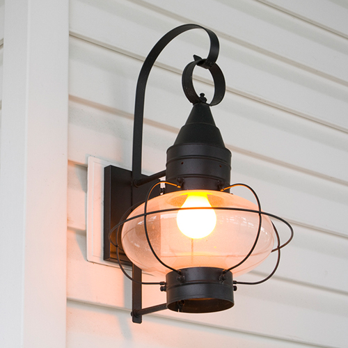 a lamp that is hanging on a wall