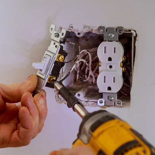 a hand holding an object