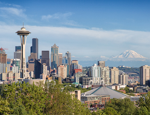 a view of a city with tall buildings in the background