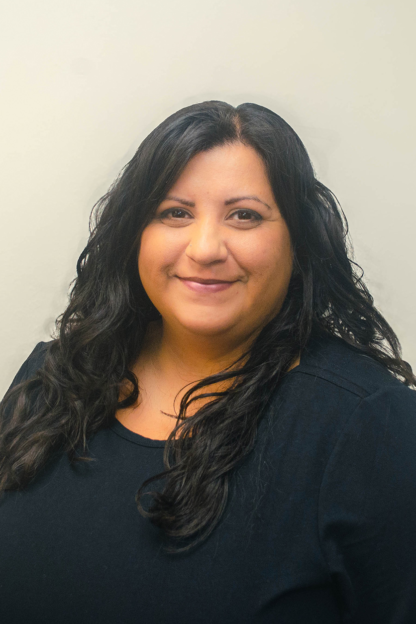 a woman smiling for the camera